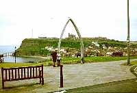Whalebone arch framing Whitby Abbey