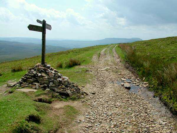 Meeting Point of Pennine Way and Dales Way, with Ingleborough in distance