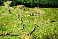 Confluence of two burns and a circular sheepfold at Riskinhope Hope